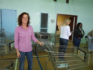 Rebekah readies her shopping cart to help families in the Santa Shop